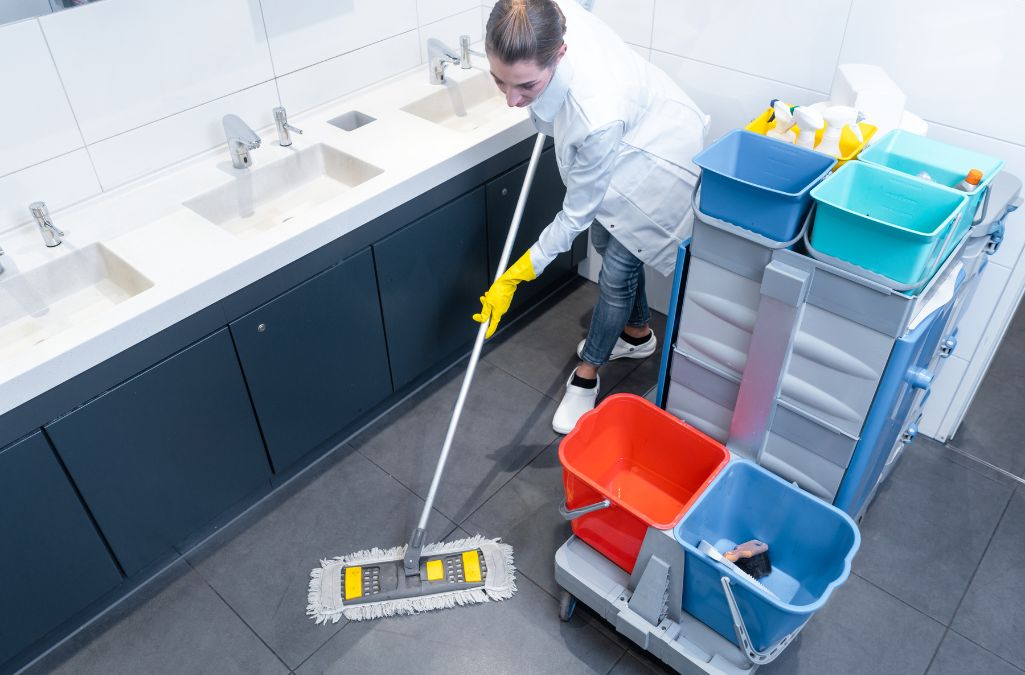 Professional cleaning crew from Queen City Cleaners at work in a Myers Park commercial building, using advanced cleaning techniques for optimal cleanliness.